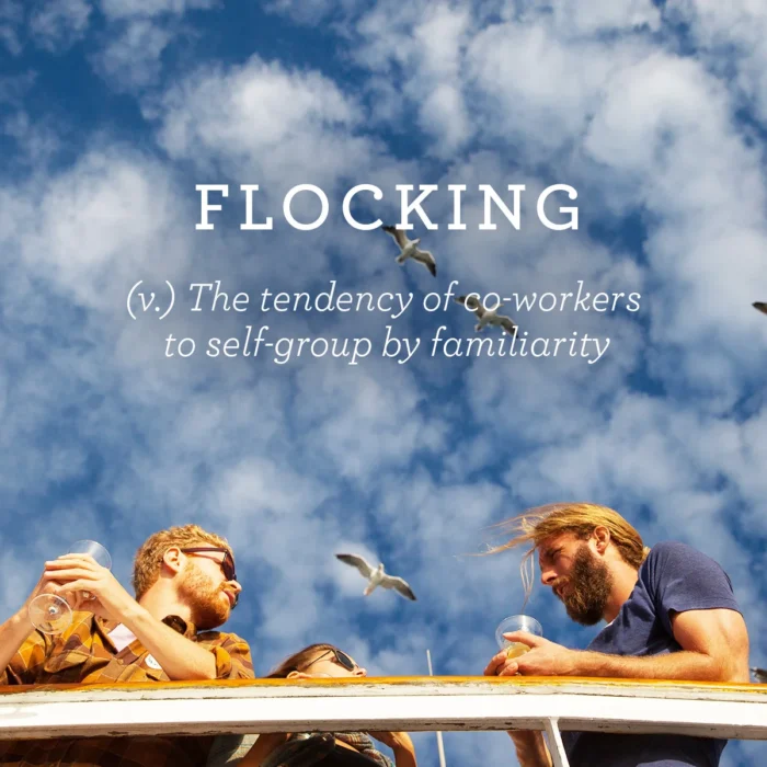 Three co-workers chatting on a Hornblower Cruises boat deck with seagulls above, alongside the witty definition “Flocking.” Advertising copy by Paul Baker for Hornblower Cruises.