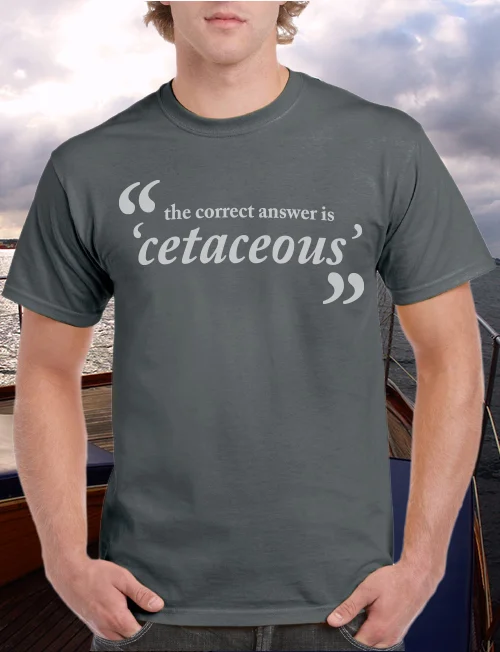 Gray T-shirt with the phrase “the correct answer is ‘cetaceous’” in white text. Part of Hornblower Cruises’ “Blubber Club” loyalty program, developed by associate creative director and writer Paul Baker to engage dedicated whale watchers with clever, insider humor.