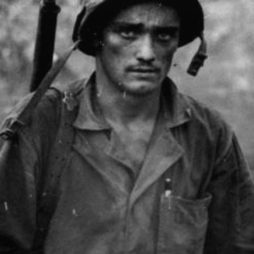 Black-and-white photo of a weary U.S. soldier in uniform and helmet during World War II, carrying his rifle. Portfolio work by lead writer Paul Baker for Bank of America’s support of Ken Burns’ documentary “The War,” which featured an online microsite and detailed episode guide.